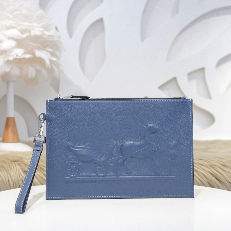 H**mes clutch bags